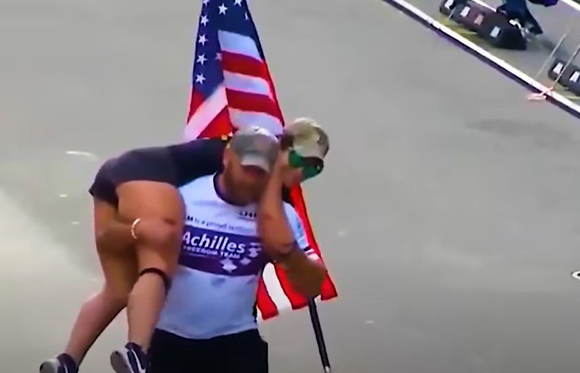 An Army Veteran Carried His Guide And America's Flag Across The Marathon Field